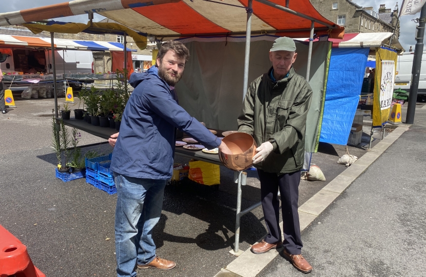 Robert Largan MP does Quarterly Members Draw at Buxton Market