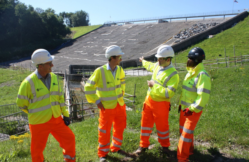 Robert Largan MP with workers on site