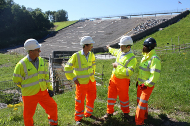 Robert Largan MP with workers on site