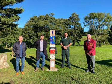 Robert at Chapel-en-le-Frith golf club, at their previous defibrillator initiative, along with the East Midlands Ambulance Service